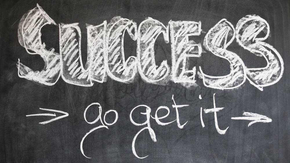 "Success - go get it" written on a chalkboard